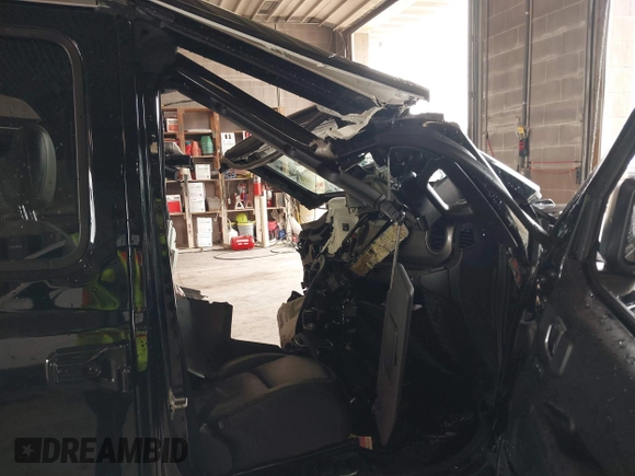 2021 Jeep Wrangler Unlimited Sport Altitude with VIN 1C4HJXDN8MW740087, listed as a IAAI auction lot 42419095 with Not provided miles and . Bid and sale history available at DreamBid. Image 5.