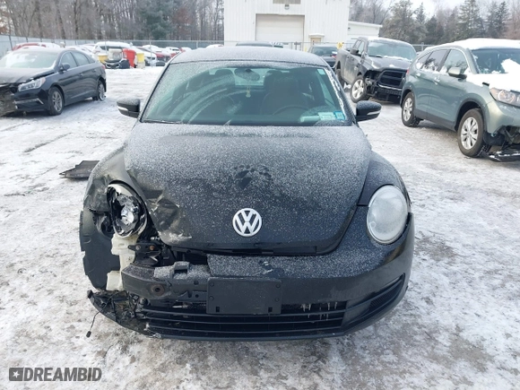 2012 Volkswagen Beetle 2.5L PZEV with VIN 3VWJP7AT8CM619137, listed as a IAAI auction lot 41195954 with 157,741 mi miles. Bid and sale history available at carsss.com. Image 12.