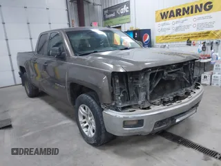 2014 Chevrolet Silverado 1500 LT with VIN 1GCVKREC9EZ240612, listed as a IAAI auction lot 41108566 with 200,625 mi miles and . Bid and sale history available at DreamBid. Image 1.