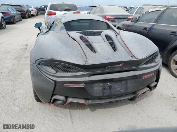 2017 McLaren 570S with VIN SBM13DAAXHW003255, listed as a Copart auction lot 76261244 with 0 mi miles and Salvage Title. Bid and sale history available at carsss.com. Image 6.