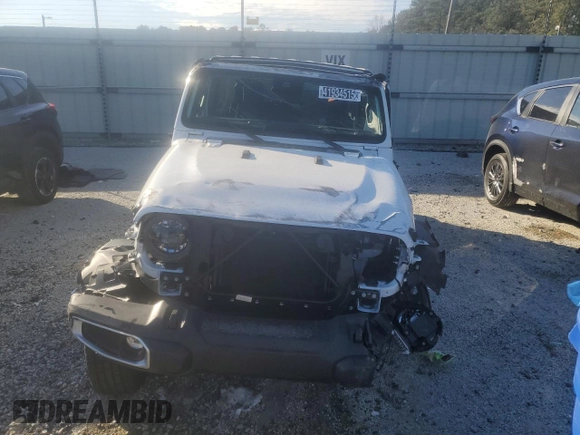 2025 Jeep Wrangler Sahara with VIN 1C4PJXENXSW500496, listed as a Copart auction lot 41934515 with 6,265 mi miles and Salvage Title. Bid and sale history available at DreamBid. Image 5.