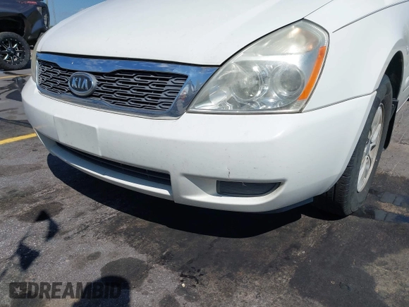2012 Kia Sedona LX with VIN KNDMG4C71C6447550, listed as a IAAI auction lot 42190357 with 161,960 mi miles. Bid and sale history available at carsss.com. Image 6.