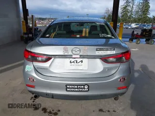 2017 Mazda Mazda6 Touring with VIN JM1GL1V50H1144637, listed as a IAAI auction lot 41849569 with 100,047 mi miles. Bid and sale history available at carsss.com. Image 16.