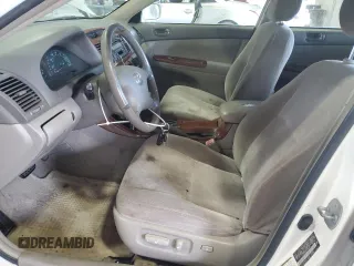 2004 Toyota Camry LE with VIN JTDBE32K940245895, listed as a Copart auction lot 63064585 with 197,467 mi miles and Clean title. Bid and sale history available at DreamBid. Image 7.