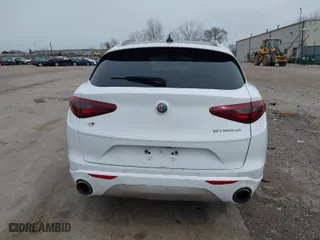 2020 Alfa Romeo Stelvio Ti with VIN ZASPAKBN6L7C92398, listed as a IAAI auction lot 41924883 with 73,683 mi miles. Bid and sale history available at carsss.com. Image 16.