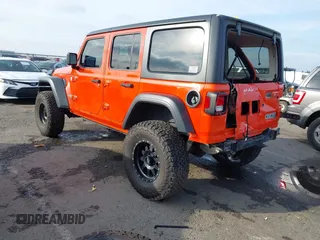 2019 Jeep Wrangler Unlimited Sport S with VIN 1C4HJXDG7KW568441, listed as a IAAI auction lot 41142271 with 73,698 mi miles and . Bid and sale history available at DreamBid. Image 3.
