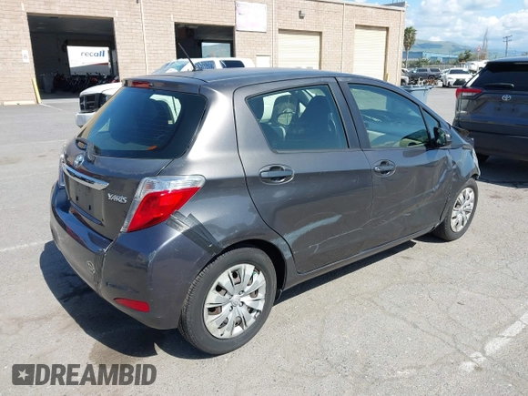 2013 Toyota Yaris L with VIN JTDKTUD36DD545176, listed as a IAAI auction lot 41953993 with 108,626 mi miles. Bid and sale history available at carsss.com. Image 4.