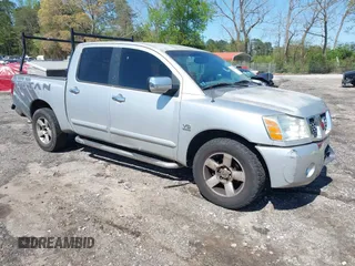 2004 Nissan Titan LE with VIN 1N6AA07AX4N575552, listed as a IAAI auction lot 41994360 with 258,524 mi miles. Bid and sale history available at carsss.com. Image 1.