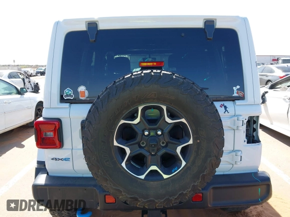 2023 Jeep Wrangler Rubicon with VIN 1C4JJXR63PW580370, listed as a IAAI auction lot 42017282 with 31,823 mi miles and . Bid and sale history available at DreamBid. Image 17.