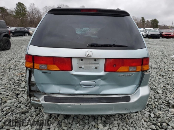 2003 Honda Odyssey EX-L with VIN 5FNRL18913B134321, listed as a Copart auction lot 44525465 with 254,666 mi miles and Salvage Title. Bid and sale history available at DreamBid. Image 6.