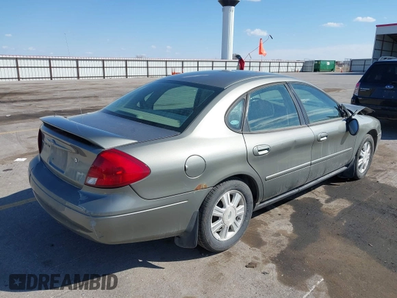 2003 Ford Taurus SES Standard with VIN 1FAFP55283G168564, listed as a IAAI auction lot 41884130 with 199,923 mi miles and . Bid and sale history available at DreamBid. Image 4.