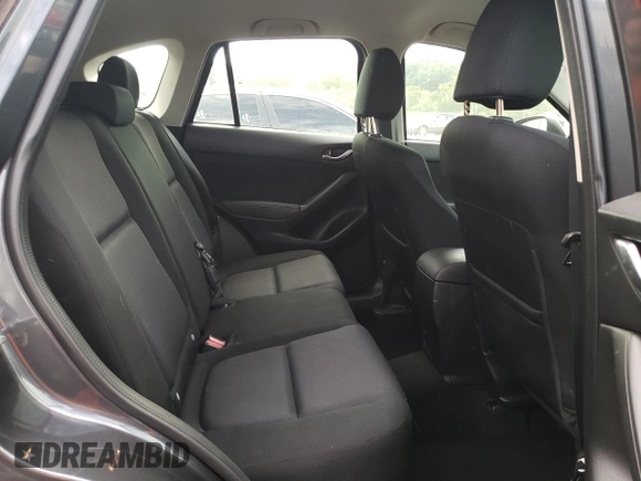 2014 Mazda CX-5 Sport with VIN JM3KE2BE9E0372370, listed as a Copart auction lot 58980165 with 175,477 mi miles and Salvage title. Bid and sale history available at DreamBid. Image 11.