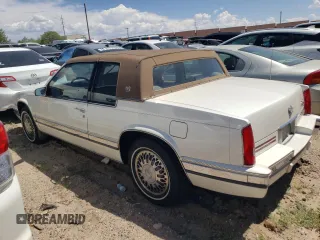 1991 Cadillac Eldorado z VIN 1G6EL13B2MU602660, wystawiony jako Copart lot #67365674 z przebiegiem 108 880 mil mil oraz Szkody całkowita. Historia ofert i sprzedaży dostępna na DreamBid. Obrazek 2.