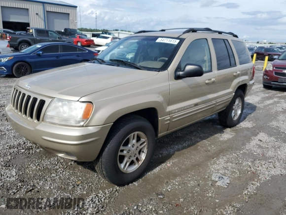2000 Jeep Grand Cherokee Limited with VIN 1J4GW58N7YC327607, listed as a Copart auction lot 54711615 with 108,241 mi miles and Salvage title. Bid and sale history available at DreamBid. Image 1.