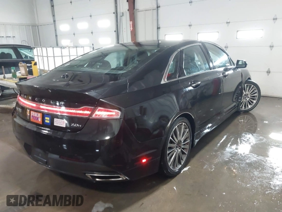 2013 Lincoln MKZ Hybrid z VIN 3LN6L2LU8DR818010, wystawiony jako IAAI lot #41363777 z przebiegiem 181 675 mil mil oraz . Historia ofert i sprzedaży dostępna na DreamBid. Obrazek 4.