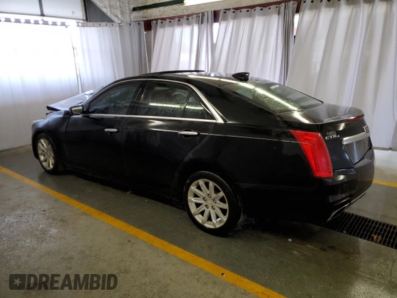2016 Cadillac CTS AWD with VIN 1G6AW5SX7G0103004, listed as a Copart auction lot 57324334 with 95,772 mi miles and Clean title. Bid and sale history available at DreamBid. Image 2.