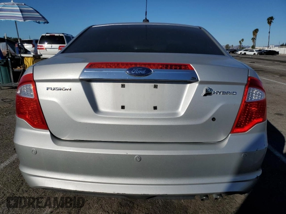 2010 Ford Fusion Hybrid с VIN 3FADP0L31AR258408, выставлен на аукционе Copart как лот 46703935 с пробегом 151 402 миль миль и Списание • Salvage title. История ставок и продаж доступна на DreamBid. Изображение 6.