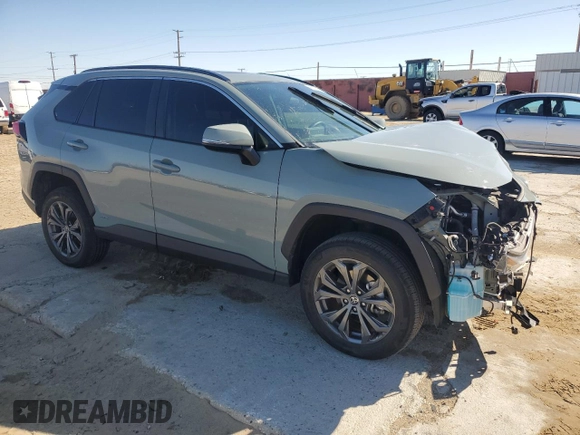 2022 Toyota RAV4 Hybrid XLE Premium with VIN 4T3B6RFV8NU102695, listed as a Copart auction lot 49876815 with 35,614 mi miles and Salvage title. Bid and sale history available at DreamBid. Image 4.