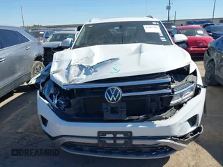 2021 Volkswagen Atlas SE z VIN 1V2JE2CA9MC200352, wystawiony jako IAAI lot #41367596 z przebiegiem 118 354 mil mil oraz . Historia ofert i sprzedaży dostępna na DreamBid. Obrazek 12.