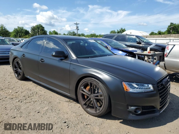 2015 Audi S8 z VIN WAUK2AFD3FN015524, wystawiony jako Copart lot #58506754 z przebiegiem 69 866 mil mil oraz Szkody całkowita. Historia ofert i sprzedaży dostępna na DreamBid. Obrazek 4.