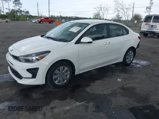 2021 Kia Rio LX with VIN 3KPA24AD0ME395186, listed as a IAAI auction lot 41865802 with 52,351 mi miles and . Bid and sale history available at DreamBid. Image 2.