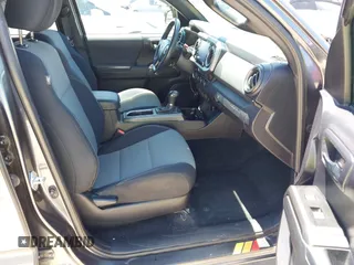 2021 Toyota Tacoma SR с VIN 3TMCZ5AN7MM399387, выставлен на аукционе IAAI как лот 42063038 с пробегом 77 894 миль миль и . История ставок и продаж доступна на DreamBid. Изображение 5.