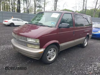 2003 Chevrolet Astro with VIN 1GNDM19X03B111420, listed as a IAAI auction lot 42210673 with 143,029 mi miles. Bid and sale history available at carsss.com. Image 2.