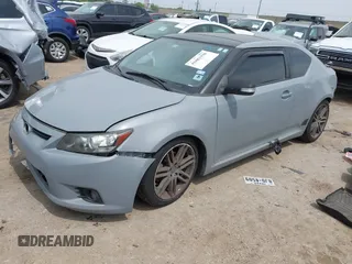 2013 Scion tC with VIN JTKJF5C7XD3046764, listed as a IAAI auction lot 41881930 with 87,701 mi miles. Bid and sale history available at carsss.com. Image 2.
