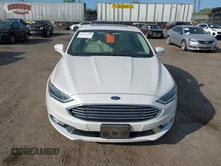 2017 Ford Fusion Hybrid Titanium с VIN 3FA6P0RU7HR148191, выставлен на аукционе IAAI как лот 42167708 с пробегом 72 708 миль миль и . История ставок и продаж доступна на DreamBid. Изображение 13.