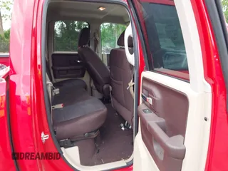 2014 Ram 1500 Big Horn z VIN 1C6RR6GG8ES429358, wystawiony jako IAAI lot #42181318 z przebiegiem 127 996 mil mil oraz . Historia ofert i sprzedaży dostępna na DreamBid. Obrazek 8.