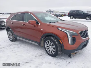 2019 Cadillac XT4 AWD Premium Luxury with VIN 1GYFZDR43KF210650, listed as a IAAI auction lot 41306632 with 58,609 mi miles. Bid and sale history available at carsss.com. Image 1.
