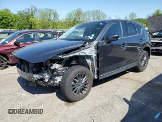 2020 Mazda CX-5 Touring with VIN JM3KFBCMXL0840848, listed as a Copart auction lot 56126625 with 49,258 mi miles and Salvage Title. Bid and sale history available at DreamBid. Image 1.