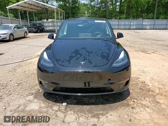 2024 Tesla Model Y z VIN 7SAYGDED2RA329802, wystawiony jako Copart lot #57748805 z przebiegiem 19 391 mil mil oraz Szkoda całkowita • Salvage title. Historia ofert i sprzedaży dostępna na DreamBid. Obrazek 15.