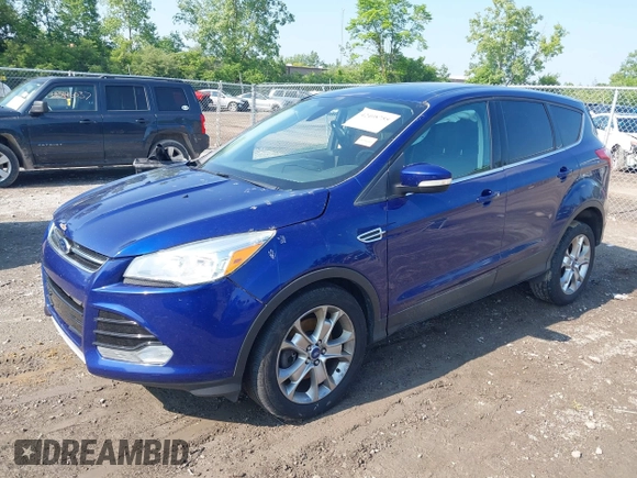 2013 Ford Escape SEL z VIN 1FMCU9H92DUA24951, wystawiony jako IAAI lot #42408755 z przebiegiem 173 549 mil mil oraz . Historia ofert i sprzedaży dostępna na DreamBid. Obrazek 2.