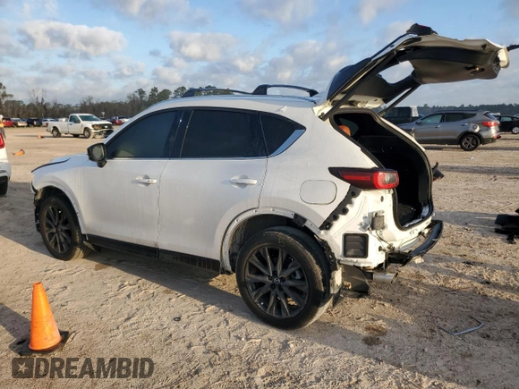 2024 Mazda CX-5 2.5 Carbon Turbo with VIN JM3KFBAY8R0443122, listed as a Copart auction lot 48023315 with 9,586 mi miles and Salvage Title. Bid and sale history available at carsss.com. Image 2.