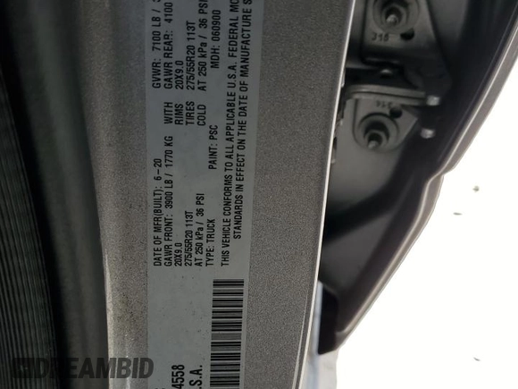 2020 Ram 1500 Big Horn with VIN 1C6SRFFT7LN334558, listed as a Copart auction lot 61487675 with 66,572 mi miles and Salvage title. Bid and sale history available at DreamBid. Image 12.