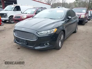 2013 Ford Fusion Titanium Hybrid with VIN 3FA6P0RU2DR281905, listed as a IAAI auction lot 41765130 with 119,348 mi miles. Bid and sale history available at carsss.com. Image 2.