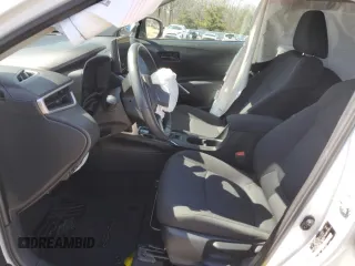 2023 Toyota Corolla Cross LE z VIN 7MUCAAAG5PV052829, wystawiony jako Copart lot #47858245 z przebiegiem 8490 mil mil oraz Szkody całkowita. Historia ofert i sprzedaży dostępna na DreamBid. Obrazek 7.