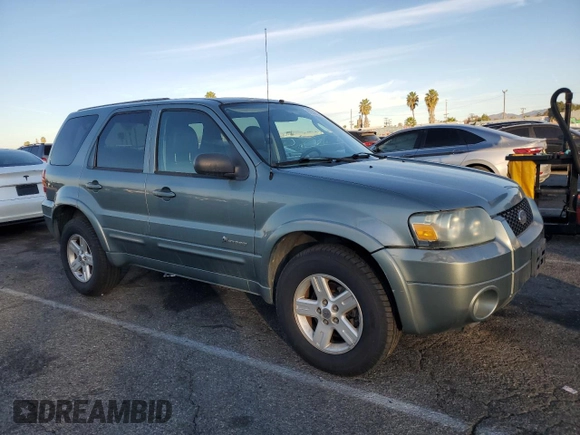 2006 Ford Escape Hybrid with VIN 1FMCU95H26KB36742, listed as a Copart auction lot 82902014 with 139,103 mi miles and Clean title. Bid and sale history available at DreamBid. Image 4.