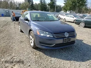 2014 Volkswagen Passat Wolfsburg Edition z VIN 1VWAT7A32EC036093, wystawiony jako Copart lot #52129185 z przebiegiem 106 949 mil mil oraz Szkoda całkowita • Salvage title. Historia ofert i sprzedaży dostępna na DreamBid. Obrazek 10.