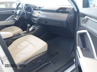 2019 Audi Q3 Premium Plus with VIN WA1BECF31K1070286, listed as a IAAI auction lot 42688823 with 51,392 mi miles and . Bid and sale history available at DreamBid. Image 5.