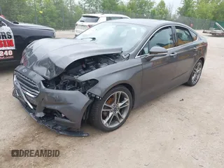 2016 Ford Fusion Titanium with VIN 3FA6P0D97GR133823, listed as a IAAI auction lot 42429708 with 166,105 mi miles and . Bid and sale history available at DreamBid. Image 2.