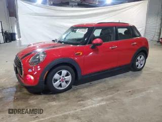 2019 MINI Hardtop 4 Door Cooper with VIN WMWXU1C58K2J01243, listed as a Copart auction lot 58120835 with 14,146 mi miles and Salvage title. Bid and sale history available at DreamBid. Image 1.