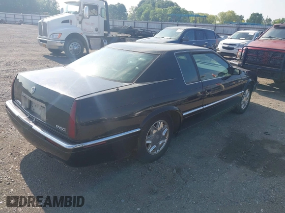 2002 Cadillac Eldorado ESC with VIN 1G6EL12YX2B105502, listed as a IAAI auction lot 42121952 with 110,261 mi miles. Bid and sale history available at carsss.com. Image 4.