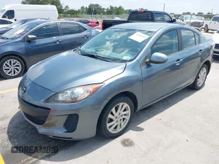 2012 Mazda 3 i Touring z VIN JM1BL1V77C1691182, wystawiony jako IAAI lot #42420310 z przebiegiem 73 099 mil mil oraz . Historia ofert i sprzedaży dostępna na DreamBid. Obrazek 2.