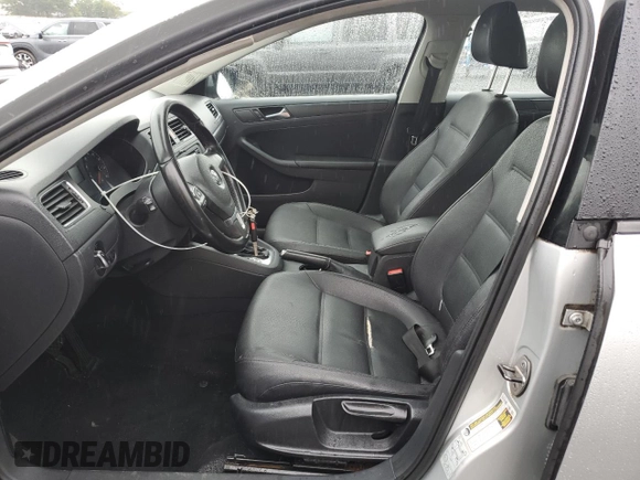 2011 Volkswagen Jetta SE with VIN 3VWDZ7AJ5BM319091, listed as a Copart auction lot 57991585 with 185,458 mi miles and Salvage title. Bid and sale history available at DreamBid. Image 7.