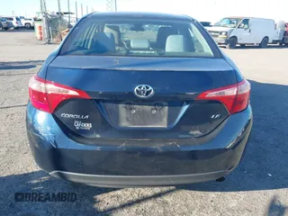 2019 Toyota Corolla L with VIN 2T1BURHE6KC188047, listed as a IAAI auction lot 41695485 with 81,908 mi miles. Bid and sale history available at carsss.com. Image 17.