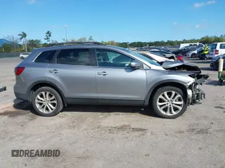 2015 Mazda CX-9 Sport with VIN JM3TB2BA1F0467162, listed as a IAAI auction lot 41565602 with 127,957 mi miles and . Bid and sale history available at carsss.com. Image 13.