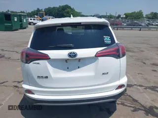 2018 Toyota RAV4 XLE z VIN 2T3WFREV1JW459553, wystawiony jako IAAI lot #42423474 z przebiegiem 129 523 mil mil oraz . Historia ofert i sprzedaży dostępna na DreamBid. Obrazek 16.
