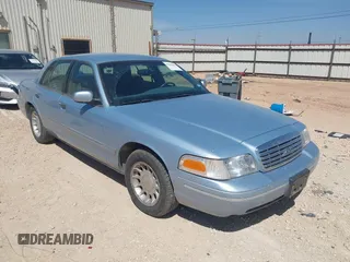 2001 Ford Crown Victoria LX z VIN 2FAFP74W61X112307, wystawiony jako IAAI lot #41816306 z przebiegiem 168 122 mil mil oraz . Historia ofert i sprzedaży dostępna na DreamBid. Obrazek 1.